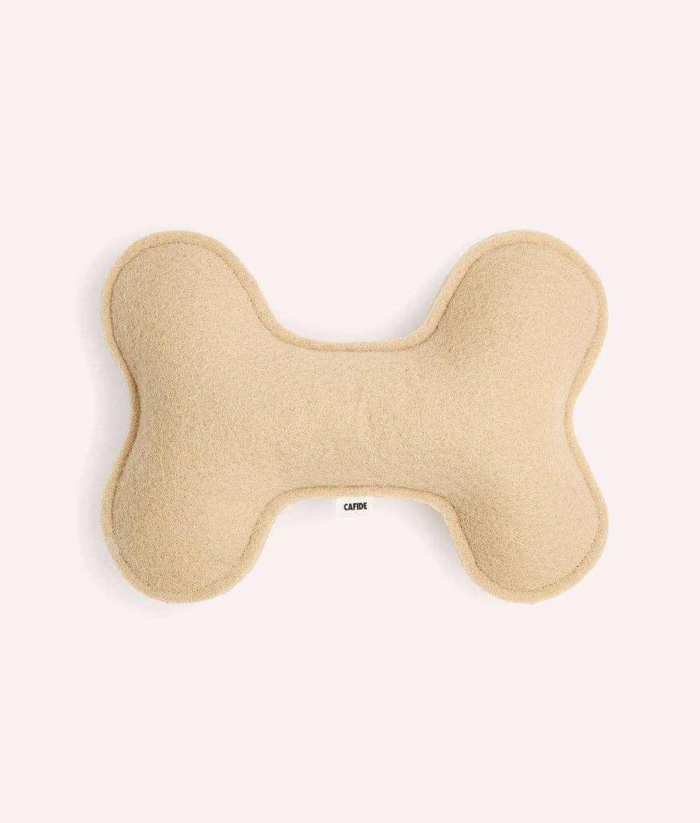 Jouet pour chien beige en forme d’os